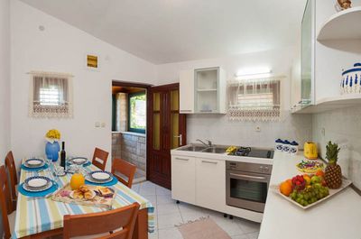 Adorable Beachfront Villa with Pool and Beautiful Garden with Barbecue near Rogoznica