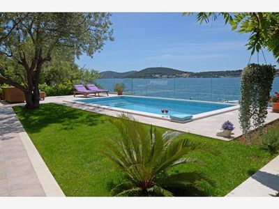 Adorable Beachfront Villa with Pool and Beautiful Garden with Barbecue near Rogoznica