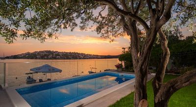 Adorable Beachfront Villa with Pool and Beautiful Garden with Barbecue near Rogoznica