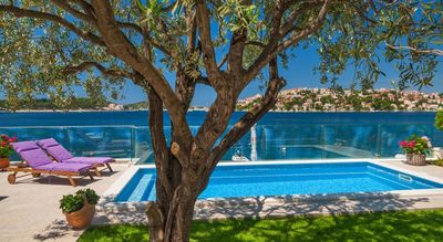 Adorable Beachfront Villa with Pool and Beautiful Garden with Barbecue near Rogoznica