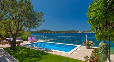 Adorable Beachfront Villa with Pool and Beautiful Garden with Barbecue near Rogoznica