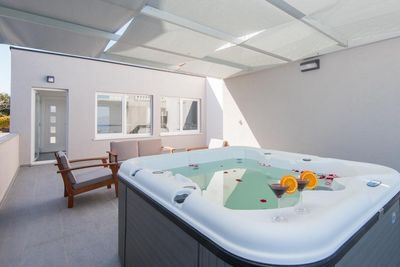 Seafront 4 Bedroom Apartment with Private Beach, Terrace and Jacuzzi  in Peljesac 