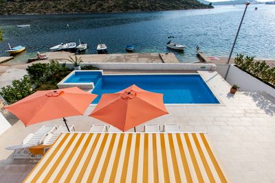 Delightful Beachfront Villa with Pool with Heating Possibility near Rogoznica