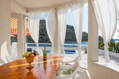 Delightful Beachfront Villa with Pool with Heating Possibility near Rogoznica