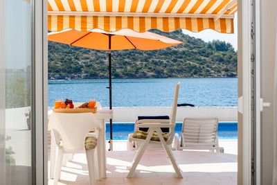 Delightful Beachfront Villa with Pool with Heating Possibility near Rogoznica
