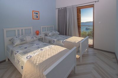 Adorable Holiday House First Row to the Sea with Private Beach near Trogir