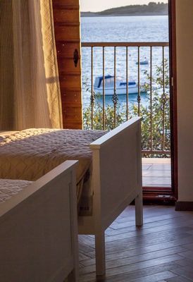 Adorable Holiday House First Row to the Sea with Private Beach near Trogir