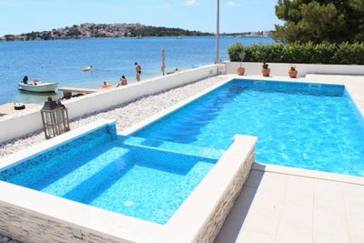 Delightful Beachfront Villa with Pool with Heating Possibility near Rogoznica