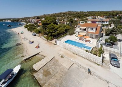 Delightful Beachfront Villa with Pool with Heating Possibility near Rogoznica