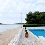 Delightful Beachfront Villa with Pool with Heating Possibility near Rogoznica