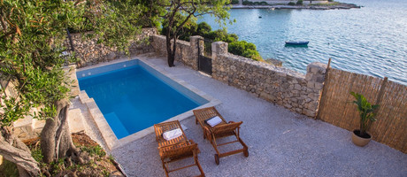 Adorable Holiday Villa with Pool First Row to the Sea and in Front of the Beach near Trogir