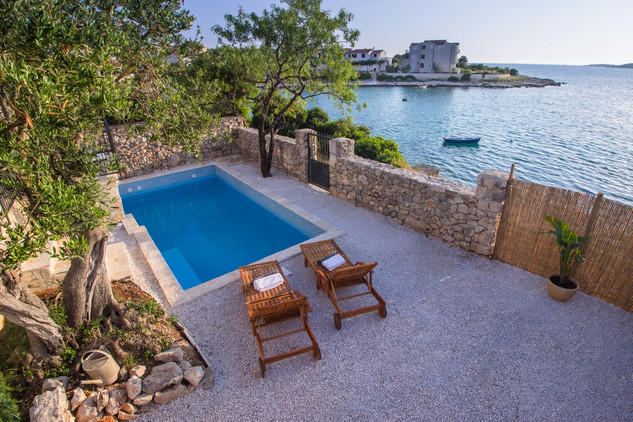 Adorable Holiday Villa with Pool First Row to the Sea and in Front of the Beach near Trogir