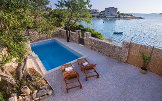 Adorable Holiday Villa with Pool First Row to the Sea and in Front of the Beach near Trogir