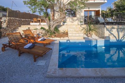 Adorable Holiday Villa with Pool First Row to the Sea and in Front of the Beach near Trogir