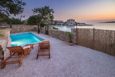 Adorable Holiday Villa with Pool First Row to the Sea and in Front of the Beach near Trogir
