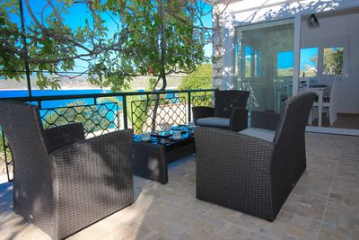 Beachfront Holiday House in Kanica with Beautiful Yard and Sea Views