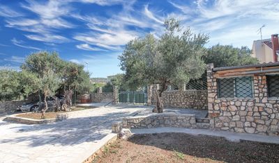 Beachfront Holiday House in Kanica with Beautiful Yard and Sea Views