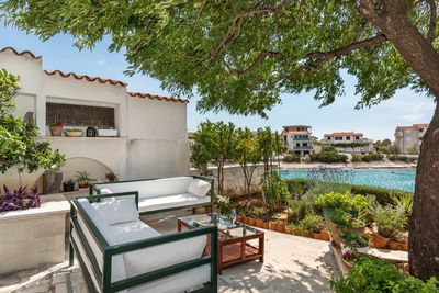 Sea Front House with Private Beach in Kanica; Rogoznica Riviera